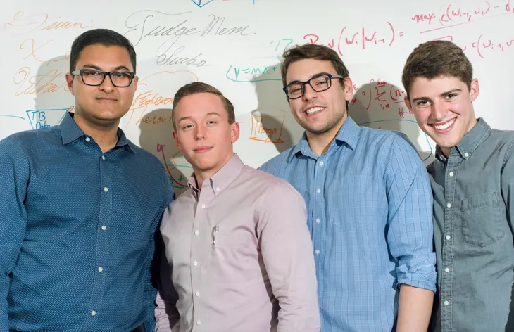 founding-team-zaid-carson-adam-ryan-ltr-with-whiteboard.jpg